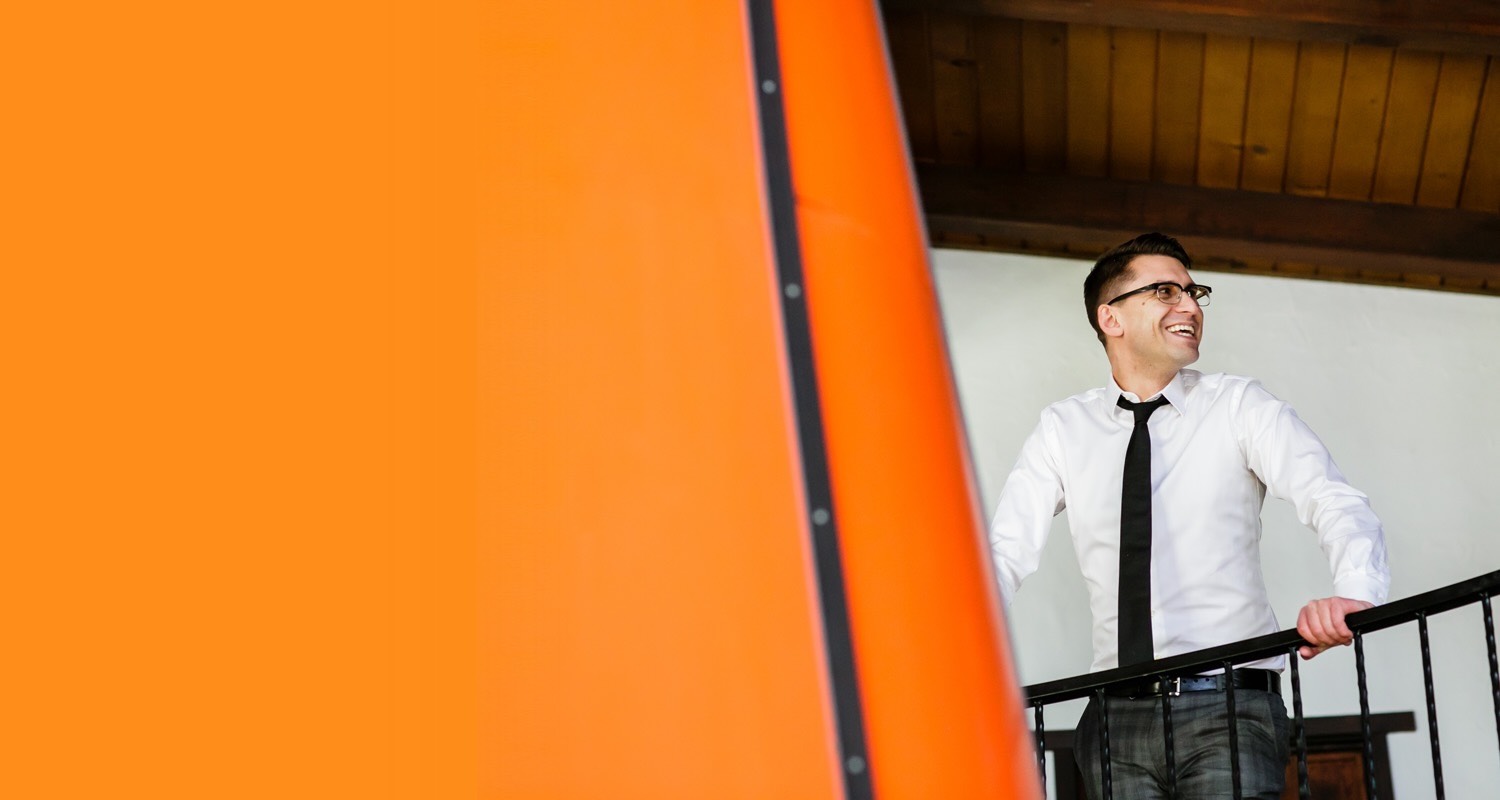Patrick looking out over a railing